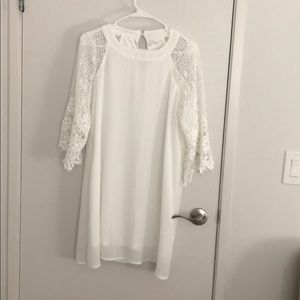 Mini dress with lace sleeves